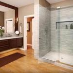 Frameless heavy-glass enclosures are a huge design trend because they give a bathroom that spacious, luxury spa-like feeling homeowners want.